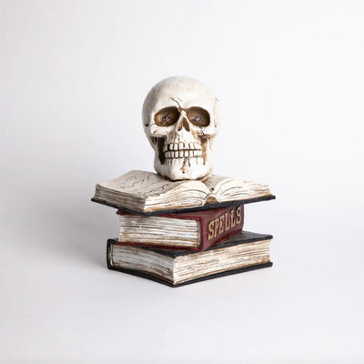 Calavera Sobre Libros con Luz Frank and Mortis